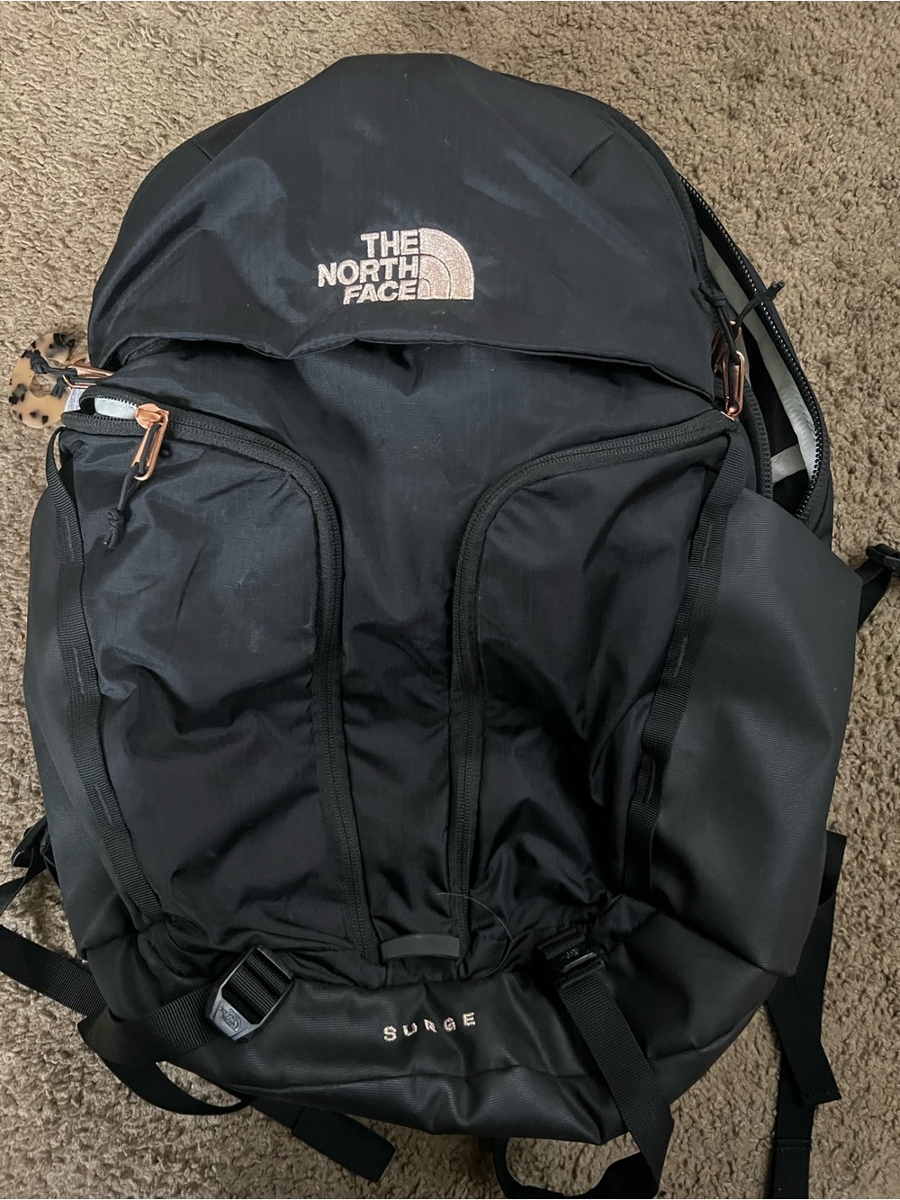 The North Face Black Backpack with Rose Gold Accents